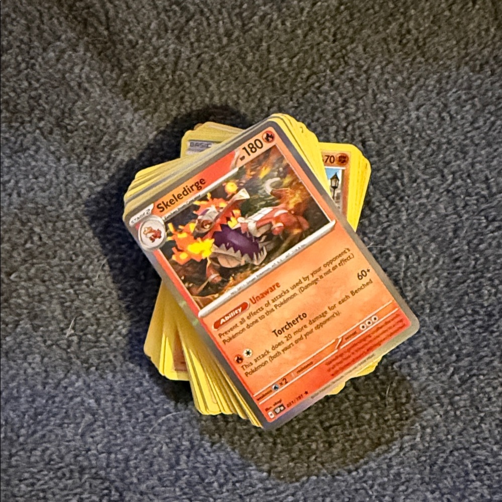 55 pokemon card  Game Booster Stack - Orange Card Front